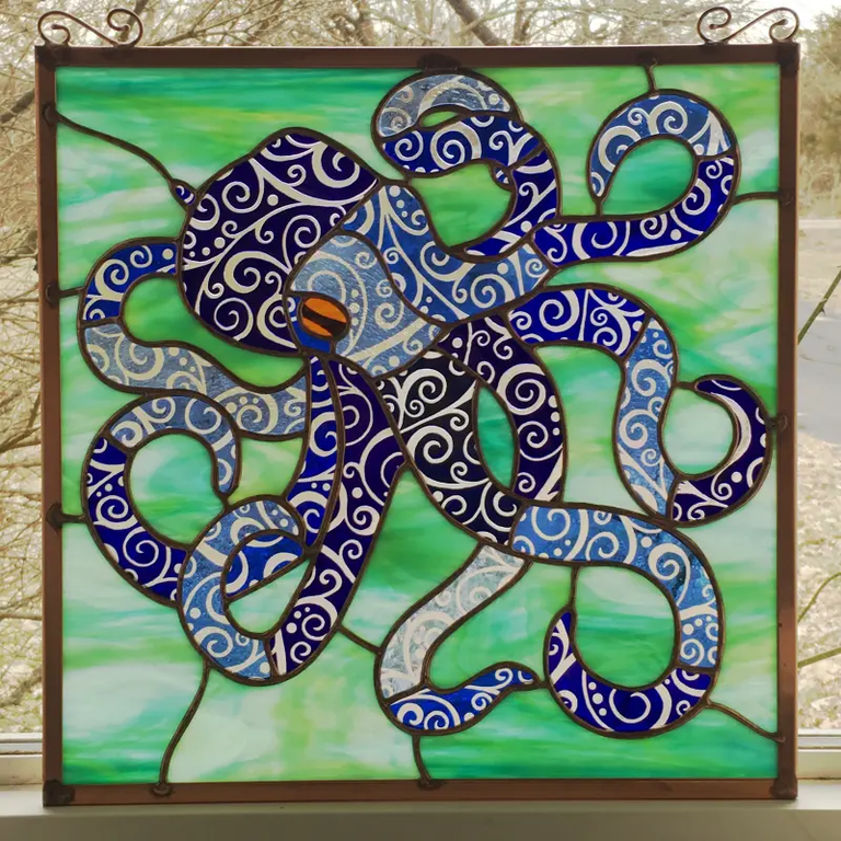 Image of an octopus rendered in stained glass